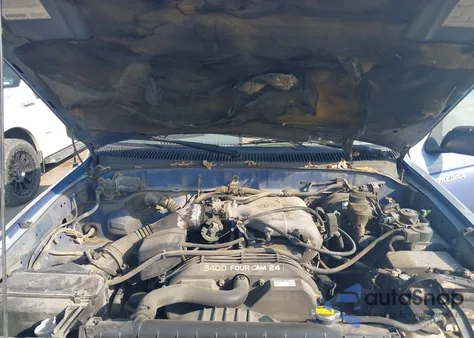 1999 Toyota Tacoma z USA, uszkodzony, nr VIN 4TAWN72N8XZ456195